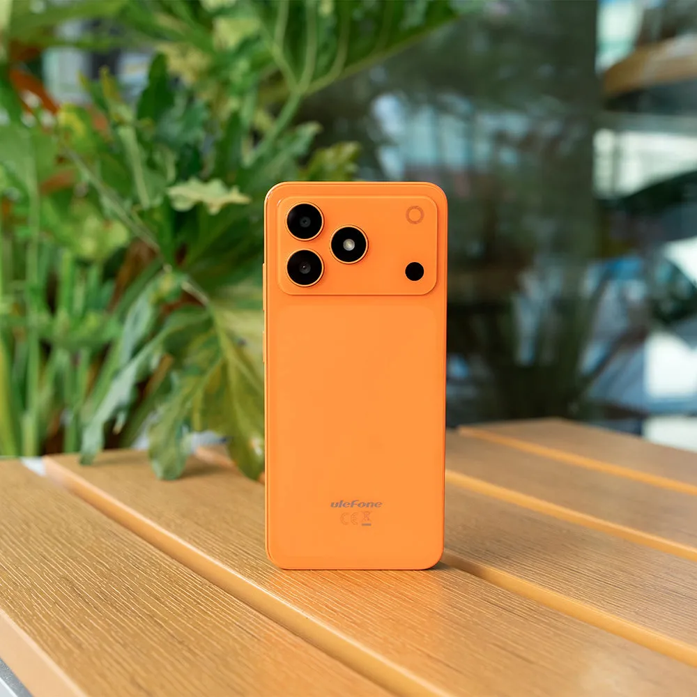Ulefone Note 23 in Cosmic Orange on a table